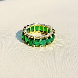 Radiant Green and Gold Eternity Ring